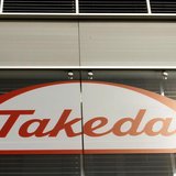 The logo of Japanese Takeda Pharmaceutical Co is seen at an office building in Glattbrugg near Zurich March 7, 2012. REUTERS/Arnd Wiegmann The logo of Japanese Takeda Pharmaceutical Co is seen at an office building in Glattbrugg near Zurich March 7, 2012. REUTERS/Arnd Wiegmann