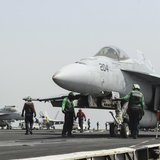 An F/A-18E Super Hornet prepares to launch from the flight deck of the aircraft carrier USS Nimitz in this U.S. Navy handout taken in the Re An F/A-18E Super Hornet prepares to launch from the flight deck of the aircraft carrier USS Nimitz in this U.S. Navy handout taken in the Re
