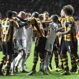Swansea City and Hull City players scuffle during their English Premier League soccer match at the Liberty Stadium in Swansea, Wales, Decemb Swansea City and Hull City players scuffle during their English Premier League soccer match at the Liberty Stadium in Swansea, Wales, Decemb