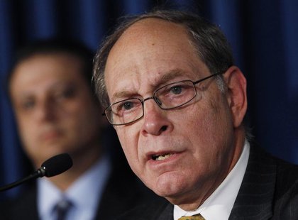 Securities Investor Protection Act (SIPA) Trustee Irving Picard speaks as Manhattan U.S. Attorney Preet Bharara (L) looks on during a news c Securities Investor Protection Act (SIPA) Trustee Irving Picard speaks as Manhattan U.S. Attorney Preet Bharara (L) looks on during a news c