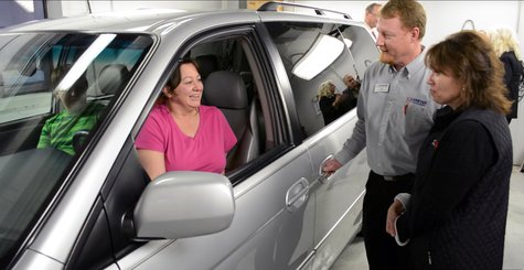 Lynnette Woyak with Pat’s CARSTAR owners Tony and Sharon Kempen and the 2003 Honda Odyssey minivan she received as part of the Recycled Rides program. Lynnette Woyak with Pat’s CARSTAR owners Tony and Sharon Kempen and the 2003 Honda Odyssey minivan she received as part of the Recycled Rides program.