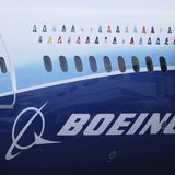 Logos of some Boeing 787 commercial airline clients are seen on a fuselage of the aircraft at the Singapore Airshow in Singapore February 14 Logos of some Boeing 787 commercial airline clients are seen on a fuselage of the aircraft at the Singapore Airshow in Singapore February 14