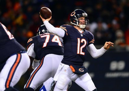Dec 9, 2013; Chicago, IL, USA; Chicago Bears quarterback Josh McCown (12) throws a pass during the third quarter against the Dallas Cowboys Dec 9, 2013; Chicago, IL, USA; Chicago Bears quarterback Josh McCown (12) throws a pass during the third quarter against the Dallas Cowboys
