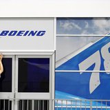 A worker prepares the Boeing chalet ahead of the Farnborough Airshow 2012 in southern England July 8, 2012. REUTERS/Luke MacGregor A worker prepares the Boeing chalet ahead of the Farnborough Airshow 2012 in southern England July 8, 2012. REUTERS/Luke MacGregor