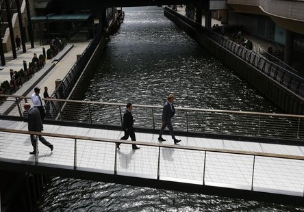 City workers cross a bridge in Canary Wharf, east London August 30, 2012. REUTERS/Olivia Harris City workers cross a bridge in Canary Wharf, east London August 30, 2012. REUTERS/Olivia Harris