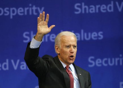 U.S. Vice President Joe Biden waves to the crowd as he leaves after delivering his speech at Yonsei University in Seoul December 6, 2013. RE U.S. Vice President Joe Biden waves to the crowd as he leaves after delivering his speech at Yonsei University in Seoul December 6, 2013. RE