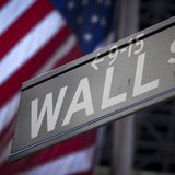 A Wall Street sign is pictured outside the New York Stock Exchange in New York, October 28, 2013. REUTERS/Carlo Allegri A Wall Street sign is pictured outside the New York Stock Exchange in New York, October 28, 2013. REUTERS/Carlo Allegri