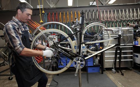 Max Stchelcine assembles a Shinola three-speed bicycle at the newly opened Shinola luxury bike and watch store in midtown Detroit, Michigan Max Stchelcine assembles a Shinola three-speed bicycle at the newly opened Shinola luxury bike and watch store in midtown Detroit, Michigan