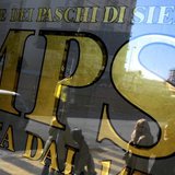 People are reflected in the window of a Monte Dei Paschi Di Siena bank in Rome January 29, 2013. REUTERS/Max Rossi People are reflected in the window of a Monte Dei Paschi Di Siena bank in Rome January 29, 2013. REUTERS/Max Rossi
