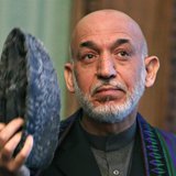 Afghanistan's President Hamid Karzai speaks during a joint news conference with Pakistan's Prime Minister Nawaz Sharif (not pictured) in Kab Afghanistan's President Hamid Karzai speaks during a joint news conference with Pakistan's Prime Minister Nawaz Sharif (not pictured) in Kab