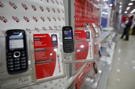 Low-cost mobile handsets from Nokia on display at a store in the western Indian city of Ahmedabad March 4, 2013. REUTERS/Amit Dave Low-cost mobile handsets from Nokia on display at a store in the western Indian city of Ahmedabad March 4, 2013. REUTERS/Amit Dave