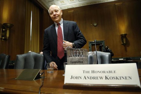 John Koskinen takes his seat to testify before a Senate Finance Committee confirmation hearing on his nomination to be commissioner of the I John Koskinen takes his seat to testify before a Senate Finance Committee confirmation hearing on his nomination to be commissioner of the I