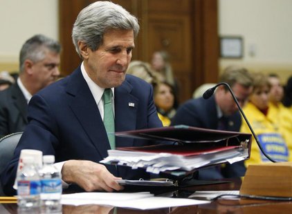 U.S. Secretary of State John Kerry places his notes on the table before testifying on agreements over Iran's nuclear programs, before the Ho U.S. Secretary of State John Kerry places his notes on the table before testifying on agreements over Iran's nuclear programs, before the Ho