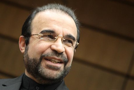 Iran's ambassador to the International Atomic Energy Agency (IAEA) Reza Najafi smiles as he arrives for a board of governors meeting at the Iran's ambassador to the International Atomic Energy Agency (IAEA) Reza Najafi smiles as he arrives for a board of governors meeting at the