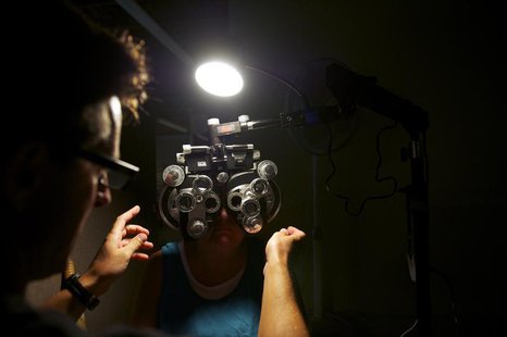 A patient has an eye exam at the Remote Area Medical (RAM) clinic in Wise, Virginia July 20, 2012. REUTERS/Mark Makela A patient has an eye exam at the Remote Area Medical (RAM) clinic in Wise, Virginia July 20, 2012. REUTERS/Mark Makela