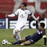 Olympiakos' David Fuster (R) tackles Anderlecht's Guillaume Gillet during their Champions League Group C soccer match at Karaiskaki stadium Olympiakos' David Fuster (R) tackles Anderlecht's Guillaume Gillet during their Champions League Group C soccer match at Karaiskaki stadium