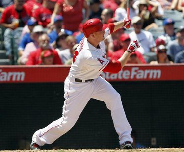 Los Angeles Angels' Mark Trumbo hits a three-run home run against the Toronto Blue Jays in the fourth inning during their MLB American Leagu Los Angeles Angels' Mark Trumbo hits a three-run home run against the Toronto Blue Jays in the fourth inning during their MLB American Leagu