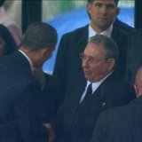 U.S. President Barack Obama (2nd L) shakes hands with Cuban President Raul Castro (C) in this still image taken from video courtesy of the South Africa Broadcasting Corporation (SABC) at the First More...
CREDIT: REUTERS/SABC VIA REUTERS TV U.S. President Barack Obama (2nd L) shakes hands with Cuban President Raul Castro (C) in this still image taken from video courtesy of the South Africa Broadcasting Corporation (SABC) at the First More...
CREDIT: REUTERS/SABC VIA REUTERS TV