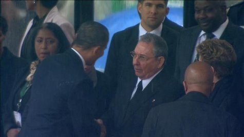 U.S. President Barack Obama (2nd L) shakes hands with Cuban President Raul Castro (C) in this still image taken from video courtesy of the South Africa Broadcasting Corporation (SABC) at the First More...
CREDIT: REUTERS/SABC VIA REUTERS TV U.S. President Barack Obama (2nd L) shakes hands with Cuban President Raul Castro (C) in this still image taken from video courtesy of the South Africa Broadcasting Corporation (SABC) at the First More...
CREDIT: REUTERS/SABC VIA REUTERS TV