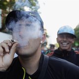 People participate in the so-called "Last demonstration with illegal marijuana" on their way to the Congress building in Montevideo, as Sena People participate in the so-called "Last demonstration with illegal marijuana" on their way to the Congress building in Montevideo, as Sena