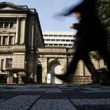 Pedestrians walk past the Bank of Japan building in Tokyo October 31, 2013. REUTERS/Yuya Shino Pedestrians walk past the Bank of Japan building in Tokyo October 31, 2013. REUTERS/Yuya Shino