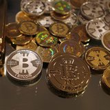 Bitcoins created by enthusiast Mike Caldwell are seen in a photo illustration at his office in Sandy, Utah, September 17, 2013. REUTERS/Jim Bitcoins created by enthusiast Mike Caldwell are seen in a photo illustration at his office in Sandy, Utah, September 17, 2013. REUTERS/Jim