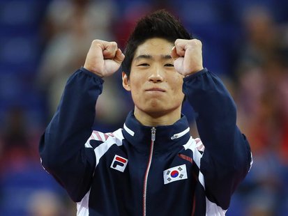 Yang Hak Seon of South Korea celebrates winning a gold medal in the men's gymnastics vault final in the North Greenwich Arena during the Lon Yang Hak Seon of South Korea celebrates winning a gold medal in the men's gymnastics vault final in the North Greenwich Arena during the Lon