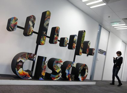 A Cisco logo is seen at its customer briefing centre in Beijing, November 14, 2013. REUTERS/Kim Kyung-Hoon A Cisco logo is seen at its customer briefing centre in Beijing, November 14, 2013. REUTERS/Kim Kyung-Hoon