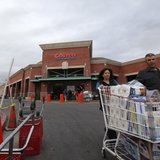 Shoppers push a trolley outside a Costco Wholesale store in Los Angeles, California March 6, 2013. REUTERS/Mario Anzuoni Shoppers push a trolley outside a Costco Wholesale store in Los Angeles, California March 6, 2013. REUTERS/Mario Anzuoni