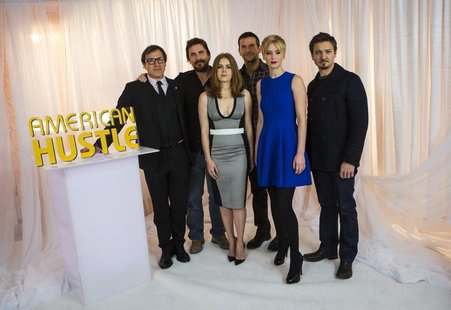 "American Hustle" director David O. Russell poses for a portrait with cast members Christian Bale, Amy Adams, Bradley Cooper, Jennifer Lawre "American Hustle" director David O. Russell poses for a portrait with cast members Christian Bale, Amy Adams, Bradley Cooper, Jennifer Lawre