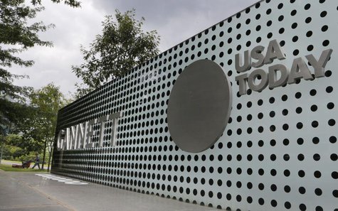 The logos of Gannett Co and its flagship newspaper, USA Today, are seen outside their corporate headquarters in McLean, Virginia, July 23, 2 The logos of Gannett Co and its flagship newspaper, USA Today, are seen outside their corporate headquarters in McLean, Virginia, July 23, 2