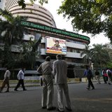 People watch a large screen displaying India's benchmark share index on the facade of the Bombay Stock Exchange (BSE) building in Mumbai Dec People watch a large screen displaying India's benchmark share index on the facade of the Bombay Stock Exchange (BSE) building in Mumbai Dec