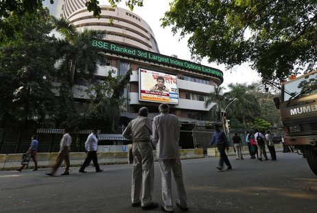 People watch a large screen displaying India's benchmark share index on the facade of the Bombay Stock Exchange (BSE) building in Mumbai Dec People watch a large screen displaying India's benchmark share index on the facade of the Bombay Stock Exchange (BSE) building in Mumbai Dec