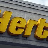 A Hertz sign is seen outside a rental car office in Ferndale, Michigan May 9, 2011. REUTERS/Rebecca Cook A Hertz sign is seen outside a rental car office in Ferndale, Michigan May 9, 2011. REUTERS/Rebecca Cook