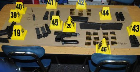 Weapons and ammunitions belonging to Sandy Hook Elementary school gunman Adam Lanza in Newtown, Connecticut are seen after its recovery at t Weapons and ammunitions belonging to Sandy Hook Elementary school gunman Adam Lanza in Newtown, Connecticut are seen after its recovery at t