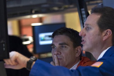 Traders work on the floor of the New York Stock Exchange December 9, 2013. REUTERS/Brendan McDermid Traders work on the floor of the New York Stock Exchange December 9, 2013. REUTERS/Brendan McDermid