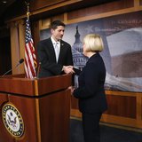Senate Budget Committee chairman Senator Patty Murray (D-WA) (R) and House Budget Committee chairman Representative Paul Ryan (R-WI) shake h Senate Budget Committee chairman Senator Patty Murray (D-WA) (R) and House Budget Committee chairman Representative Paul Ryan (R-WI) shake h