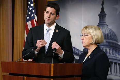 Senate Budget Committee chairman Senator Patty Murray (D-WA) (R) and House Budget Committee chairman Representative Paul Ryan (R-WI) (L) hol Senate Budget Committee chairman Senator Patty Murray (D-WA) (R) and House Budget Committee chairman Representative Paul Ryan (R-WI) (L) hol