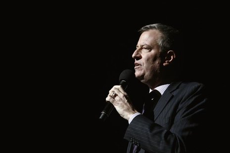 Mayor-elect Bill de Blasio speaks to guests during a tribute service for Nelson Mandela at the Christian Cultural Center in the Brooklyn are Mayor-elect Bill de Blasio speaks to guests during a tribute service for Nelson Mandela at the Christian Cultural Center in the Brooklyn are