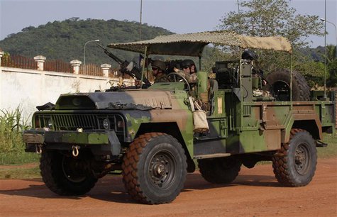 French soldiers are seen on their military vehicle at the Miskine district in Bangui December 10, 2013. REUTERS/Emmanuel Braun French soldiers are seen on their military vehicle at the Miskine district in Bangui December 10, 2013. REUTERS/Emmanuel Braun