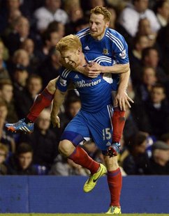 Hull City's Paul McShane (L) celebrates his goal against Tottenham Hotspur with Stephen Quinn during their English League Cup fourth round s Hull City's Paul McShane (L) celebrates his goal against Tottenham Hotspur with Stephen Quinn during their English League Cup fourth round s