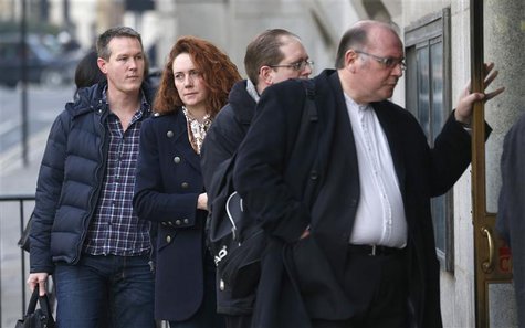 Former News International chief executive Rebekah Brooks queues as she arrives at the Old Bailey courthouse in central London December 10, 2 Former News International chief executive Rebekah Brooks queues as she arrives at the Old Bailey courthouse in central London December 10, 2
