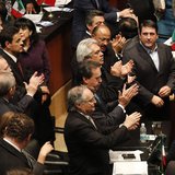 Senators of the ruling Institutional Revolutionary Party (PRI) applaud after Mexico's Senate signed off on an energy bill at the Senate buil Senators of the ruling Institutional Revolutionary Party (PRI) applaud after Mexico's Senate signed off on an energy bill at the Senate buil