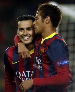 Barcelona's Pedro Rodriguez (L) is congratulated by team mate Neymar after scoring a goal against Celtic during their Champions League socce Barcelona's Pedro Rodriguez (L) is congratulated by team mate Neymar after scoring a goal against Celtic during their Champions League socce