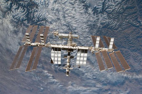 Backdropped by Earth, the International Space Station is seen in this image photographed by an STS-130 crew member on space shuttle Endeavou Backdropped by Earth, the International Space Station is seen in this image photographed by an STS-130 crew member on space shuttle Endeavou