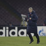 Arsenal's Coach Arsene Wenger leaves the pich at the half-time of the the Champions League soccer match against Naples at San Paolo stadium Arsenal's Coach Arsene Wenger leaves the pich at the half-time of the the Champions League soccer match against Naples at San Paolo stadium