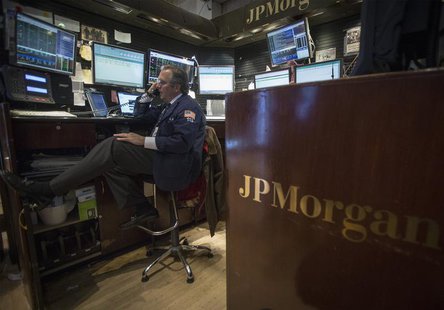 A trader works at the JP Morgan stall on the floor of the New York Stock Exchange, November 19, 2013. REUTERS/Brendan McDermid A trader works at the JP Morgan stall on the floor of the New York Stock Exchange, November 19, 2013. REUTERS/Brendan McDermid