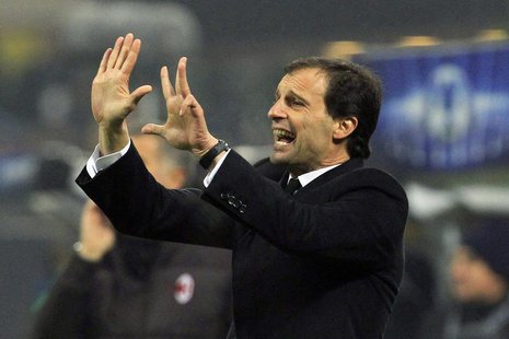 AC Milan's coach Massimiliano Allegri reacts during their Champions League soccer match against Ajax Amsterdam at the San Siro stadium in Mi AC Milan's coach Massimiliano Allegri reacts during their Champions League soccer match against Ajax Amsterdam at the San Siro stadium in Mi