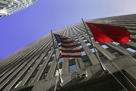 The flags of the U.S. and China hang outside of 85 Broad Street, headquarters for the investment bank Goldman Sachs in New York, October 23, The flags of the U.S. and China hang outside of 85 Broad Street, headquarters for the investment bank Goldman Sachs in New York, October 23,