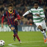 Barcelona's Neymar (L) and Celtic's Efe Ambrose challenge for the ball during their Champions League soccer match at Camp Nou stadium in Bar Barcelona's Neymar (L) and Celtic's Efe Ambrose challenge for the ball during their Champions League soccer match at Camp Nou stadium in Bar